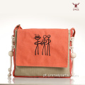 Bolsa crossbody de lona com símbolo primitivo Mei Yi Arts